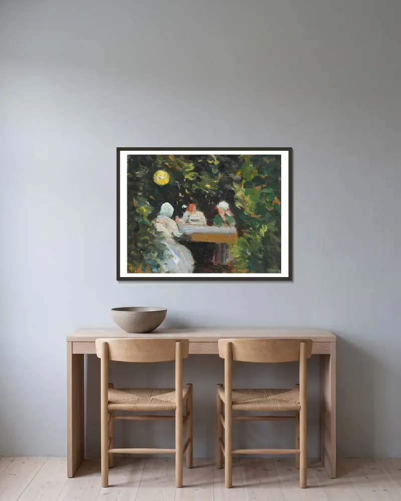 Komsammen i haven en sommeraften under lampen av Michael Ancher inramad på en vägg
