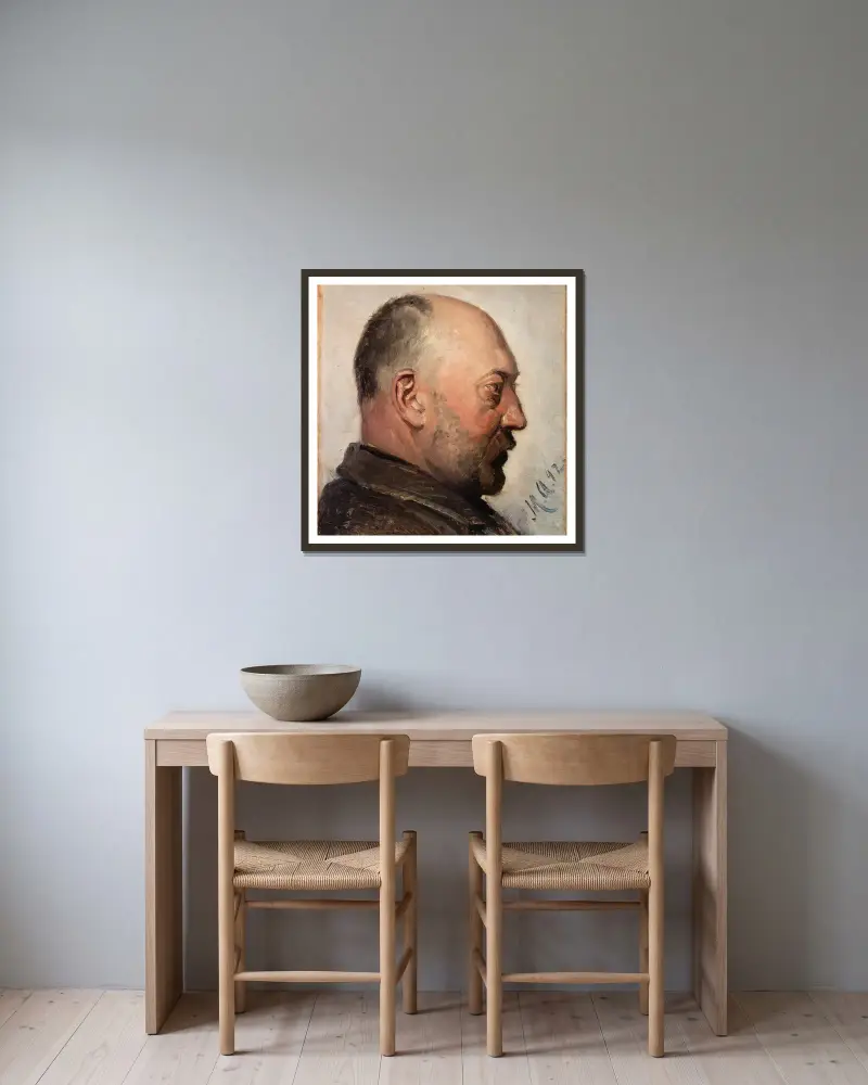 Thorvald Bindesbøll av Michael Ancher inramad på en vägg