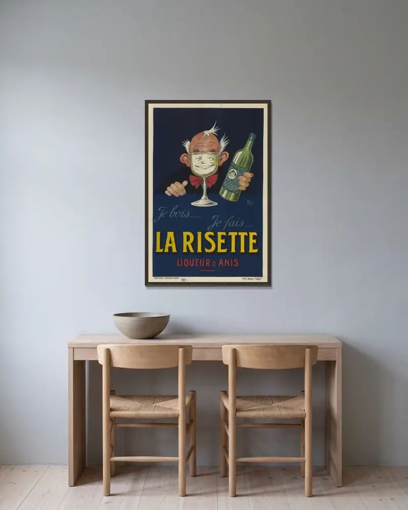 Jag dricker. Jag ler, anislikör av Mich (Michel Liebeaux) inramad på en vägg