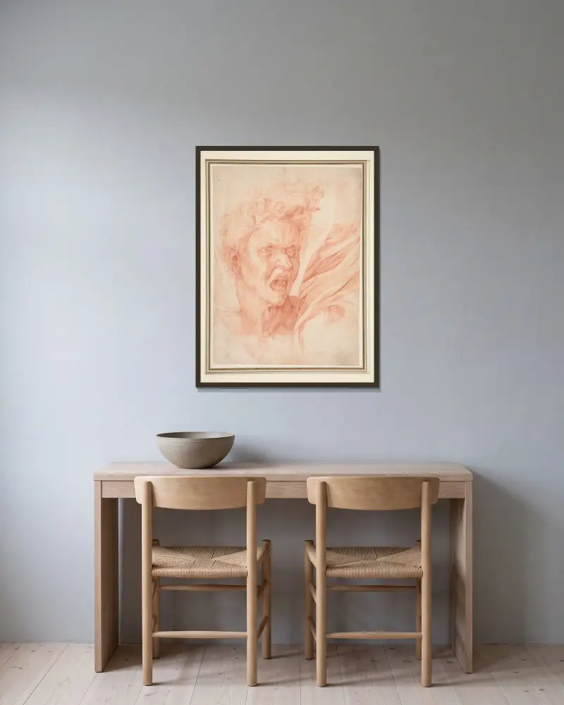 Huvud av en förtappad själ av Michelangelo inramad på en vägg