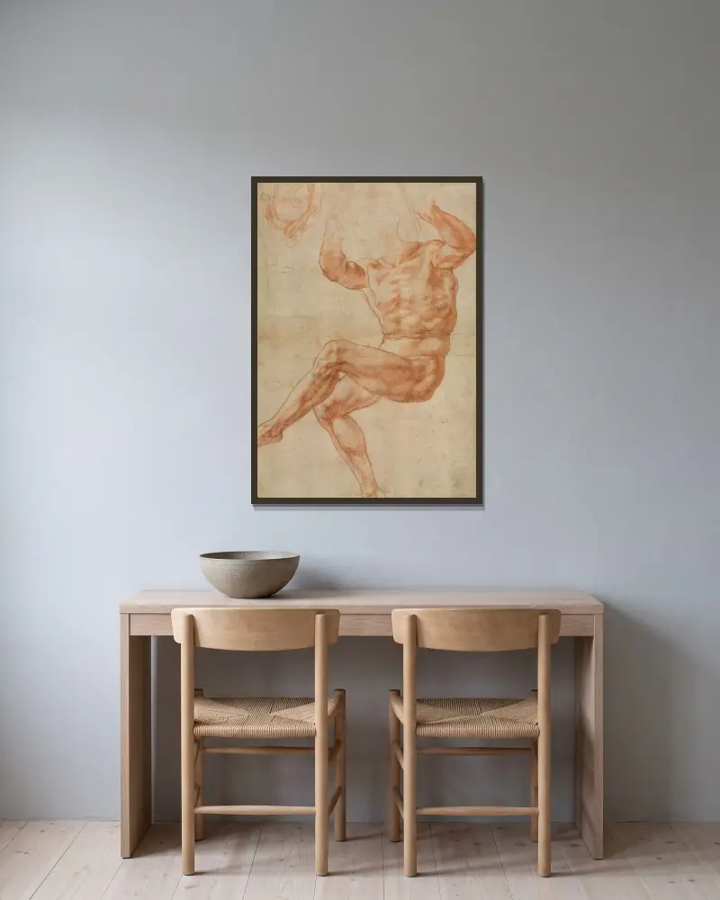 Studie till den nakna ynglingen ovanför profeten Daniel (framst sida) av Michelangelo inramad på en vägg
