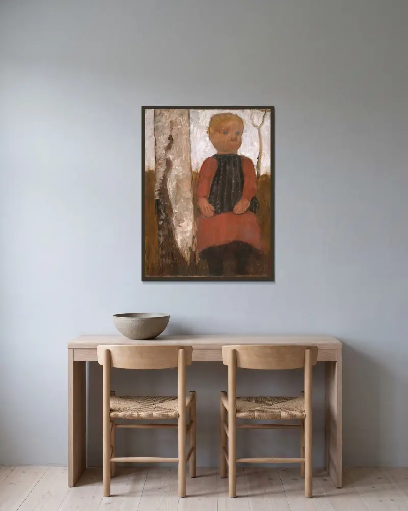 Flicka i röd klänning av Paula Modersohn-Becker inramad på en vägg