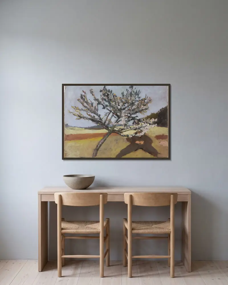 Mann unter einem blühenden Baum liegend von Paula Modersohn-Becker gerahmt an einer Wand