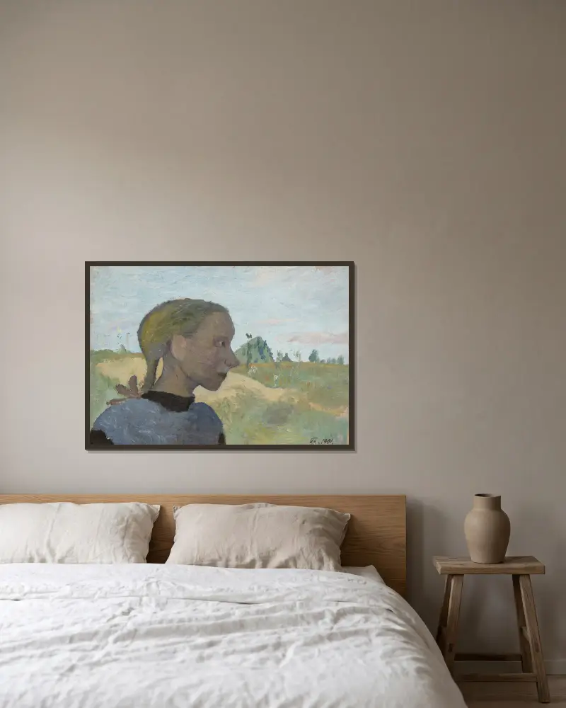 Porträtt av en flicka av Paula Modersohn-Becker inramad på en vägg