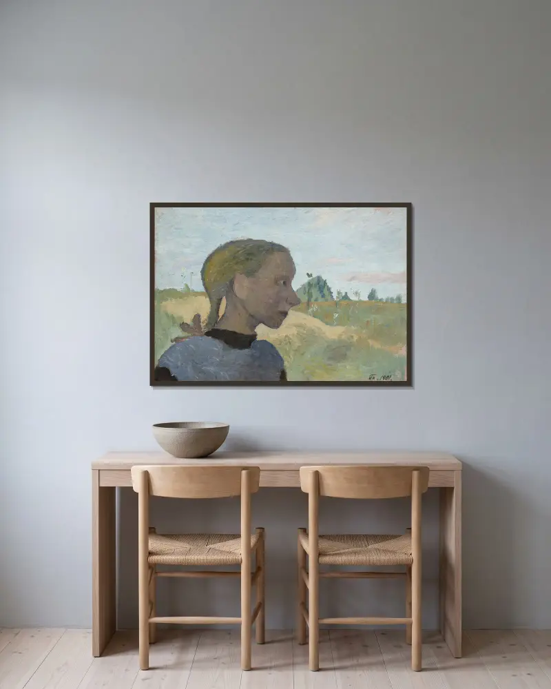Porträtt av en flicka av Paula Modersohn-Becker inramad på en vägg