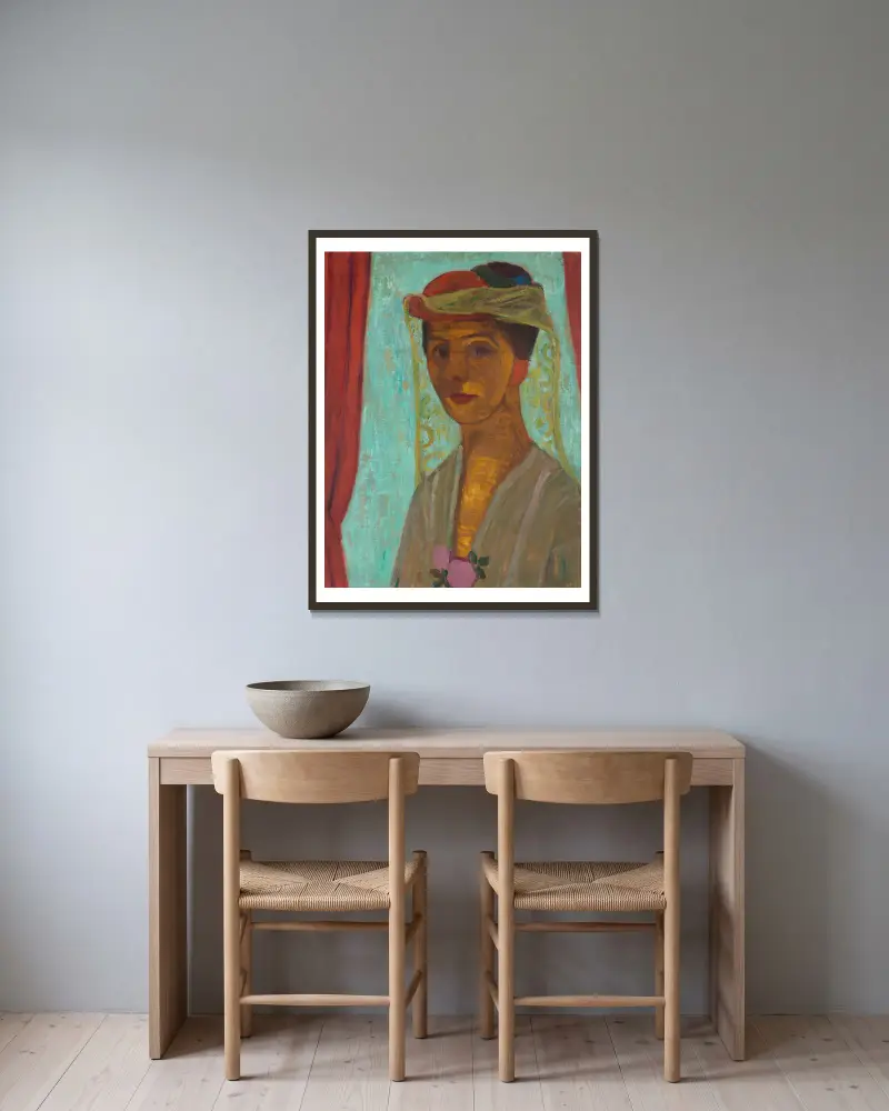 Self-portrait with hat and veil av Paula Modersohn-Becker inramad på en vägg