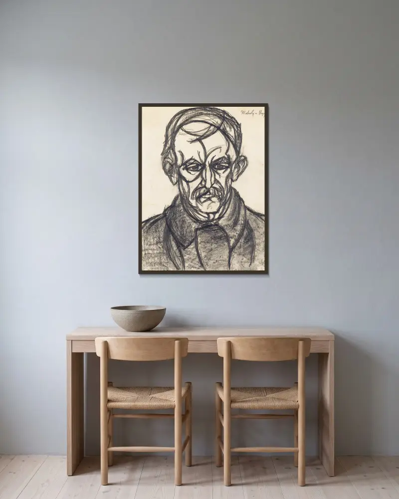 Portrét muže, László Moholy-Nagy v rámu na stěně