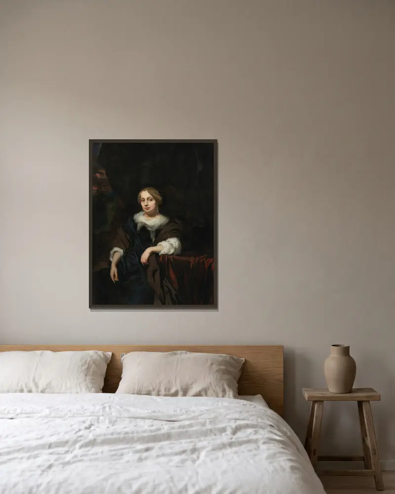 Bildnis einer Dame von Nicolaes Maes gerahmt an einer Wand