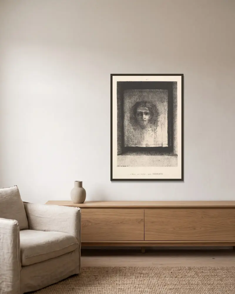 A Veil, a Printed Image av Odilon Redon inramad på en vägg