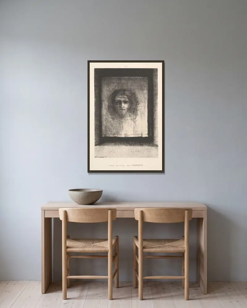 A Veil, a Printed Image av Odilon Redon inramad på en vägg