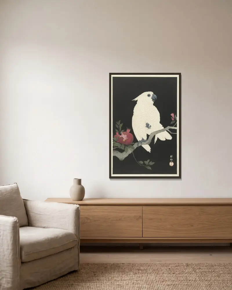 Kakadu und Granatapfel von Ohara Koson gerahmt an einer Wand