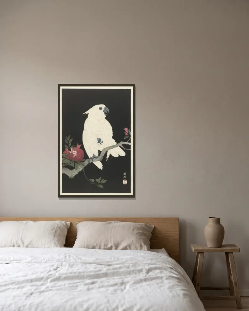 Kakadu und Granatapfel von Ohara Koson gerahmt an einer Wand