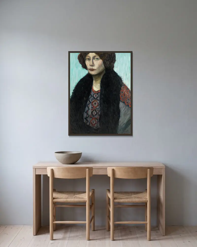 Portrait Louise Modersohn-Breling av Otto Modersohn inramad på en vägg
