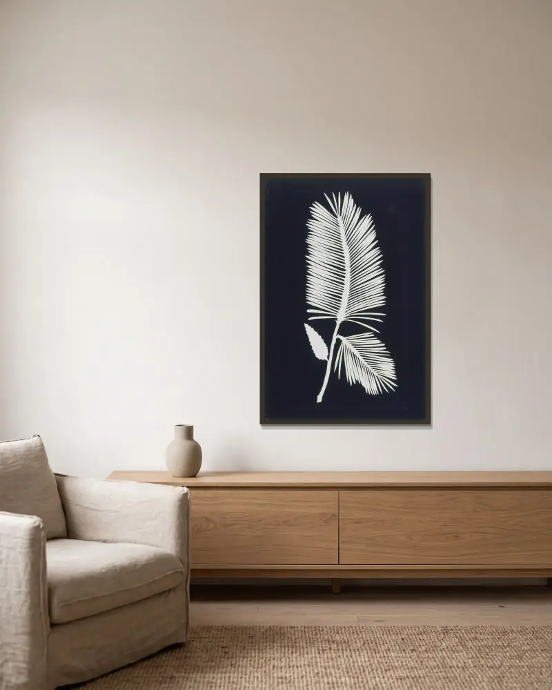 Palmwedel von Philipp Otto Runge gerahmt an einer Wand
