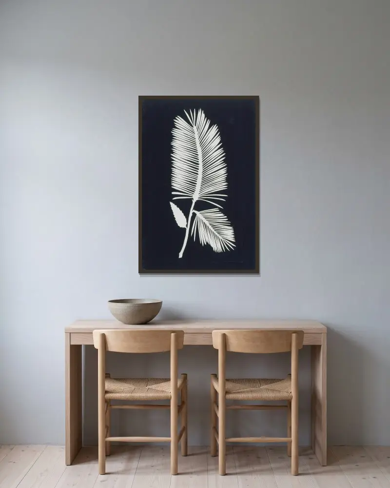 Palmwedel von Philipp Otto Runge gerahmt an einer Wand