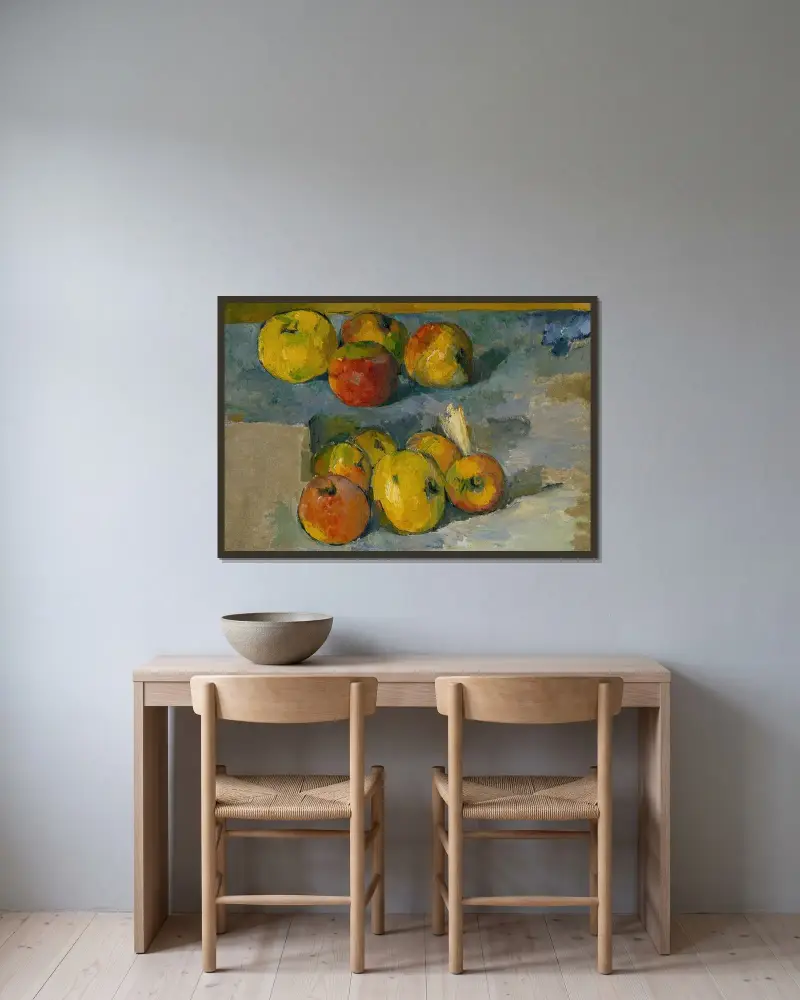 Apples av Paul Cézanne inramad på en vägg