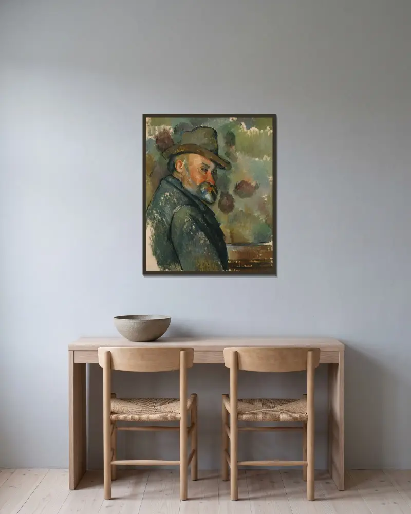 Cézanne mit weichem Hut von Paul Cézanne gerahmt an einer Wand