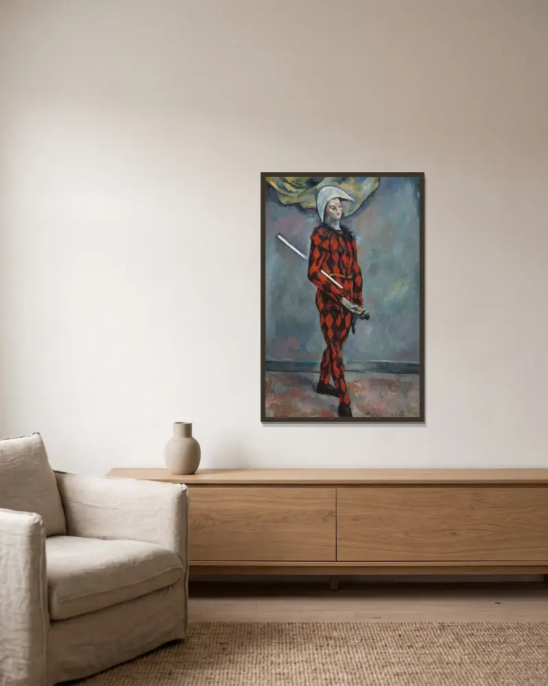 Harlequin av Paul Cézanne inramad på en vägg