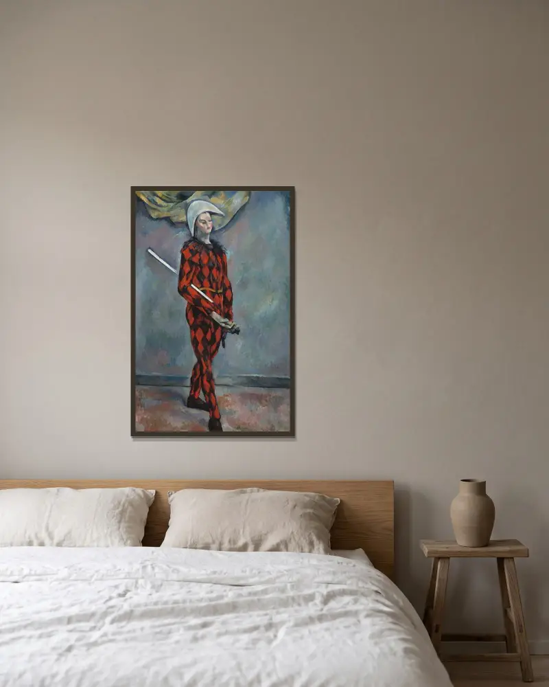 Harlequin av Paul Cézanne inramad på en vägg