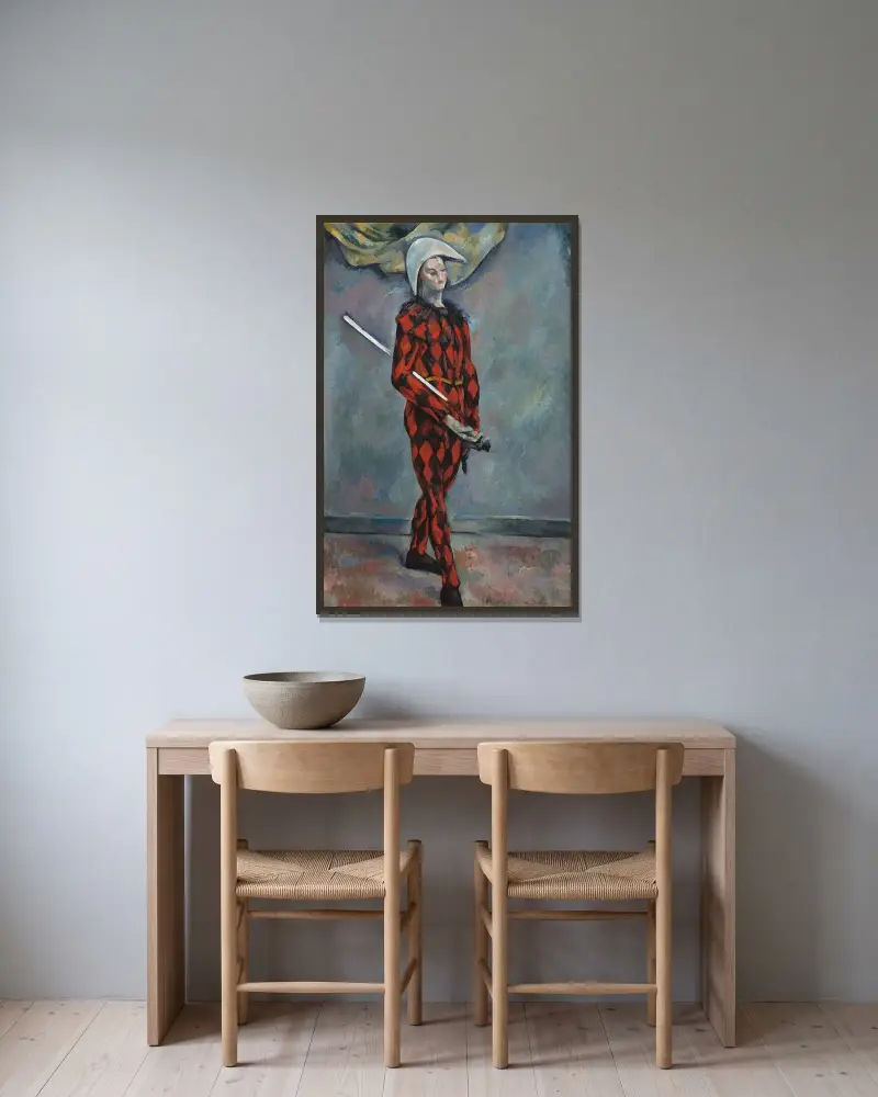 Harlequin av Paul Cézanne inramad på en vägg