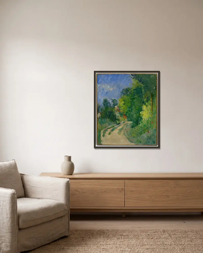 Den slingrande vägen i skogsmarken av Paul Cézanne inramad på en vägg