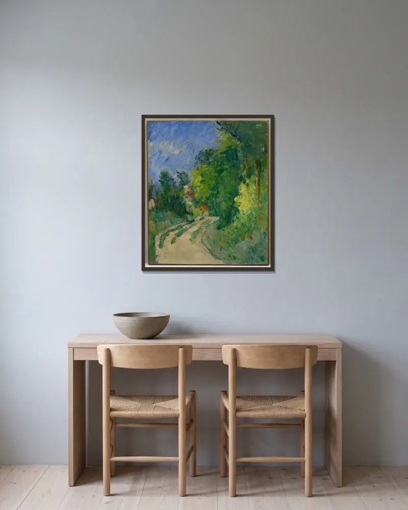 Den slingrande vägen i skogsmarken av Paul Cézanne inramad på en vägg
