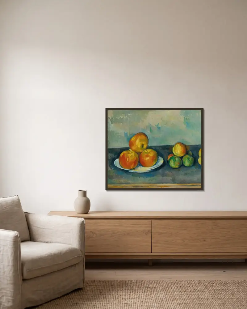 Les Pommes av Paul Cézanne inramad på en vägg