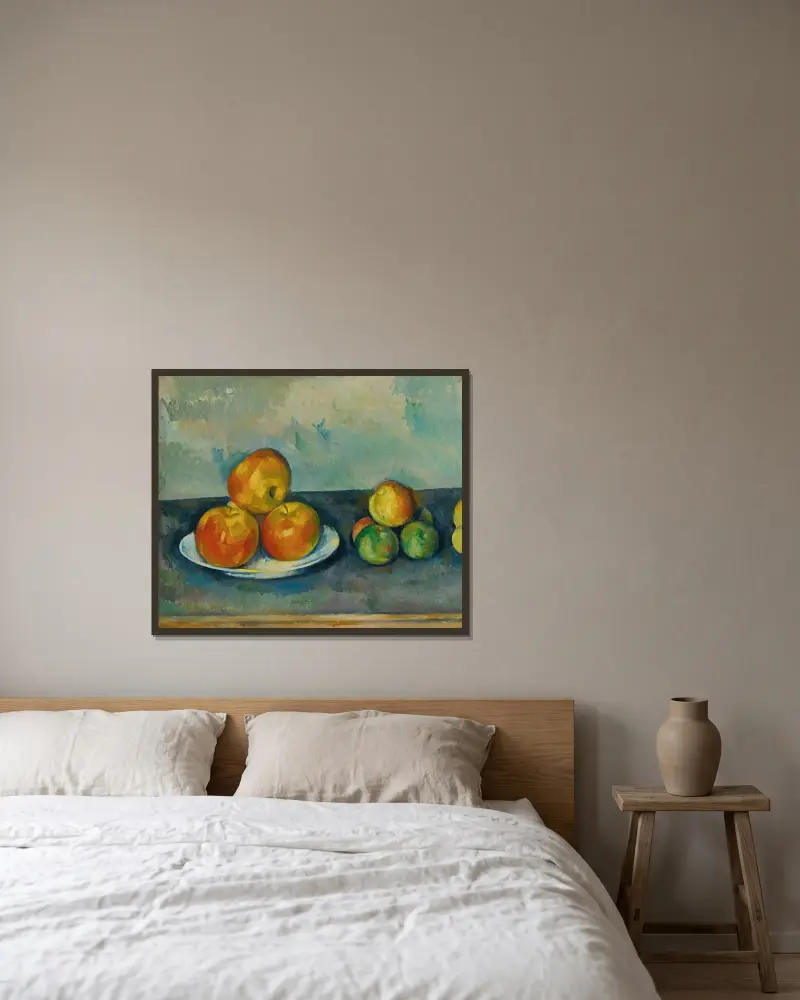 Les Pommes av Paul Cézanne inramad på en vägg