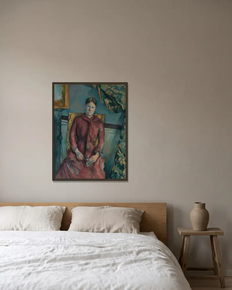 Madame Cézanne i röd klänning av Paul Cézanne inramad på en vägg