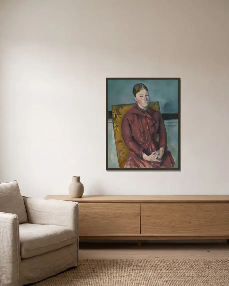 Madame Cézanne i gul stol av Paul Cézanne inramad på en vägg