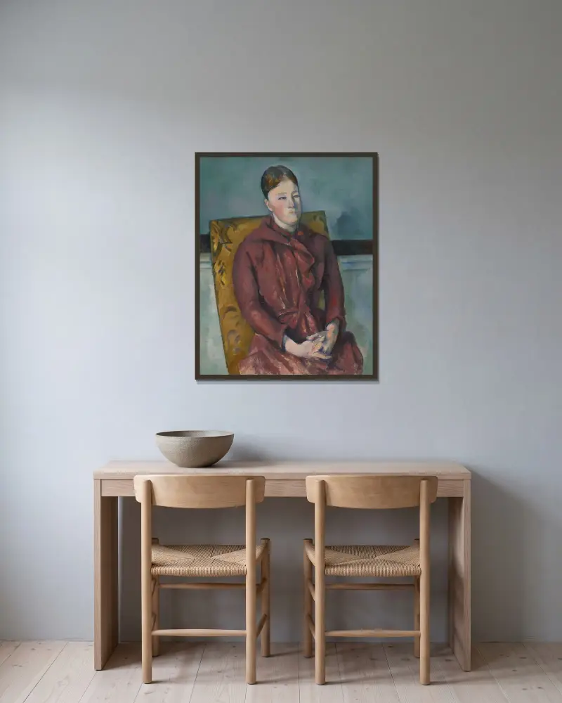 Madame Cézanne i gul stol av Paul Cézanne inramad på en vägg