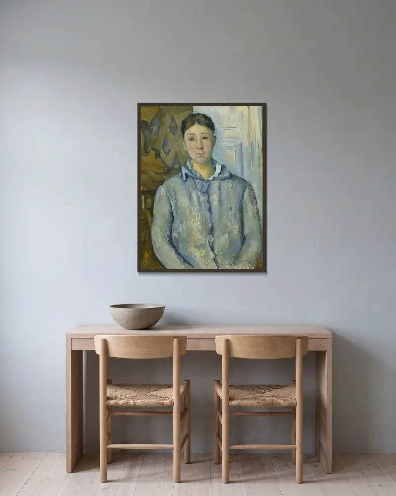 Madame Cézanne in Blue av Paul Cézanne inramad på en vägg