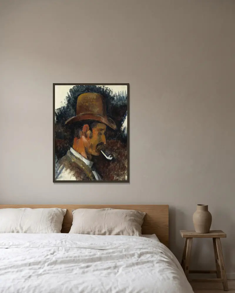 Man with Pipe av Paul Cézanne inramad på en vägg