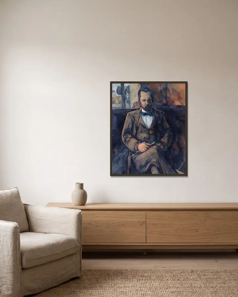 Portrait d’Ambroise Vollard av Paul Cézanne inramad på en vägg