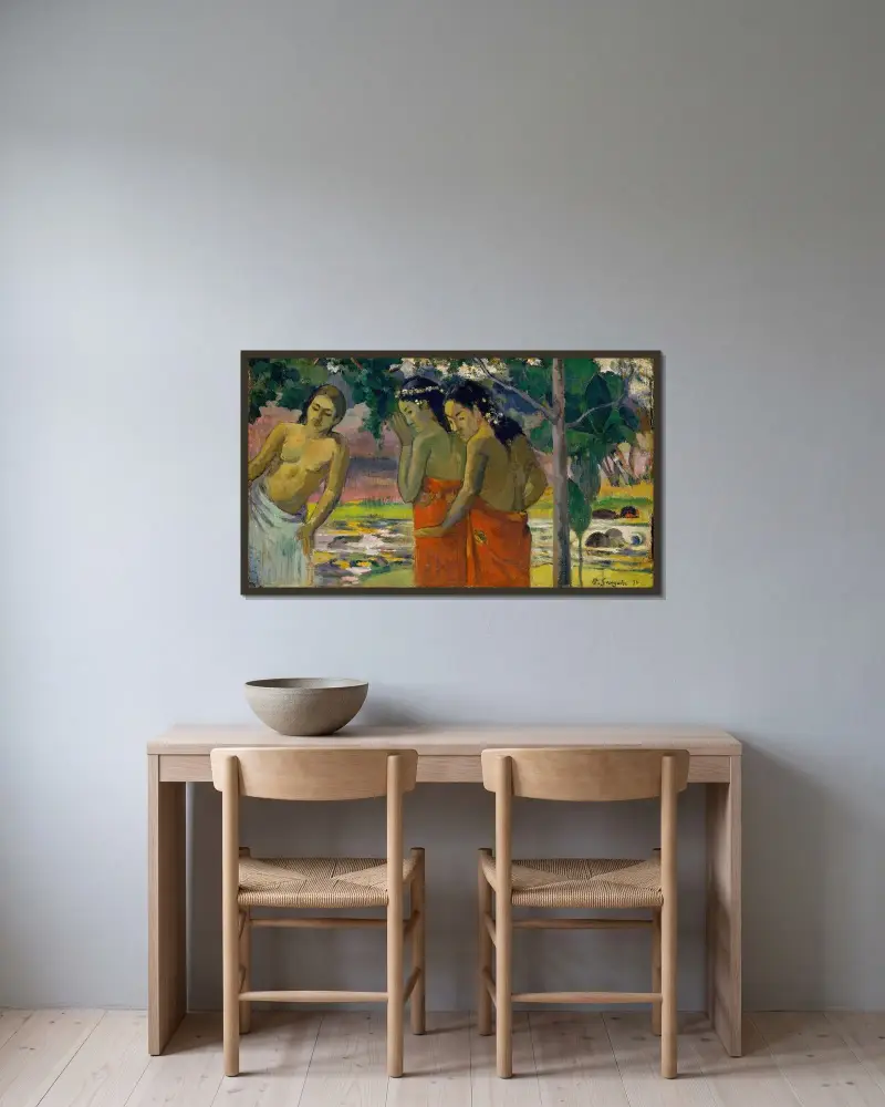 Tre tahitiska kvinnor av Paul Gauguin inramad på en vägg