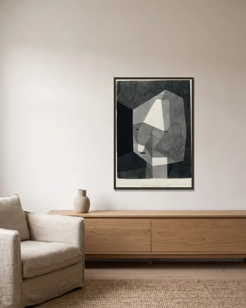 Hrubě otesaná hlava, Paul Klee v rámu na stěně