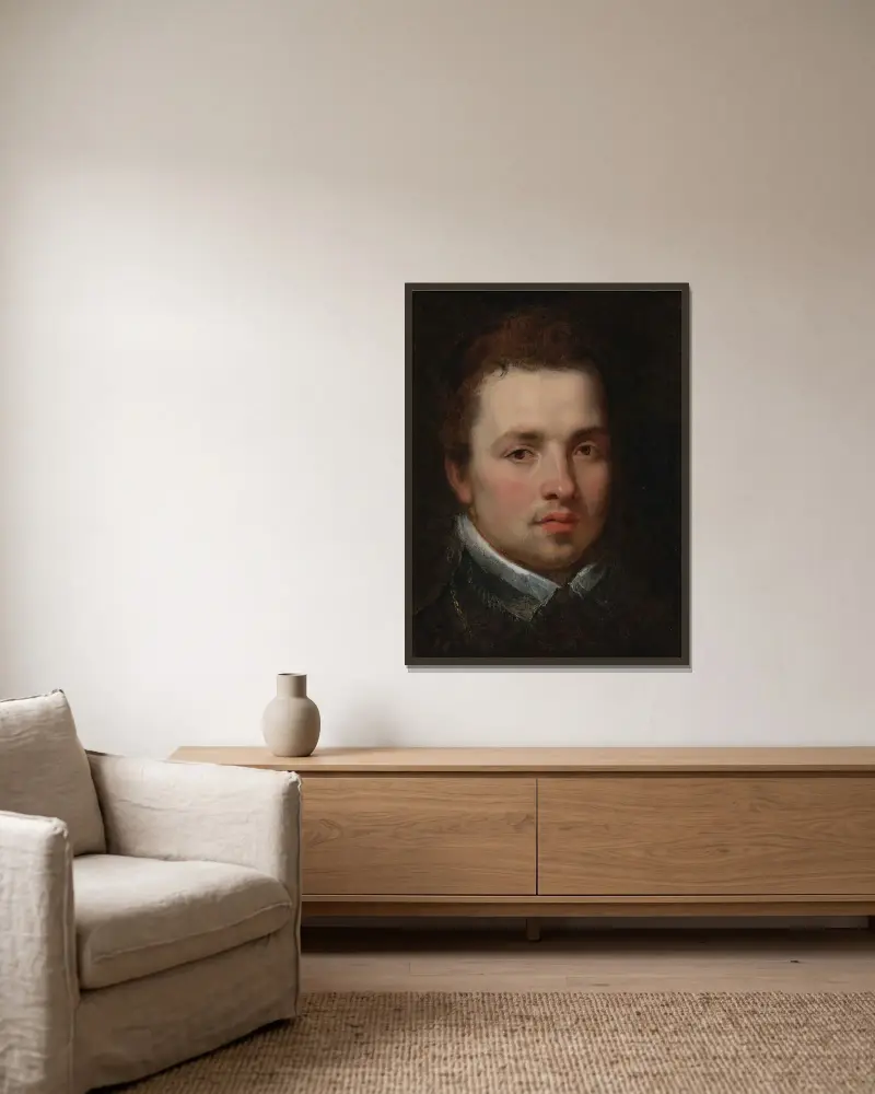 Portrait of a Young Man av Peter Paul Rubens inramad på en vägg