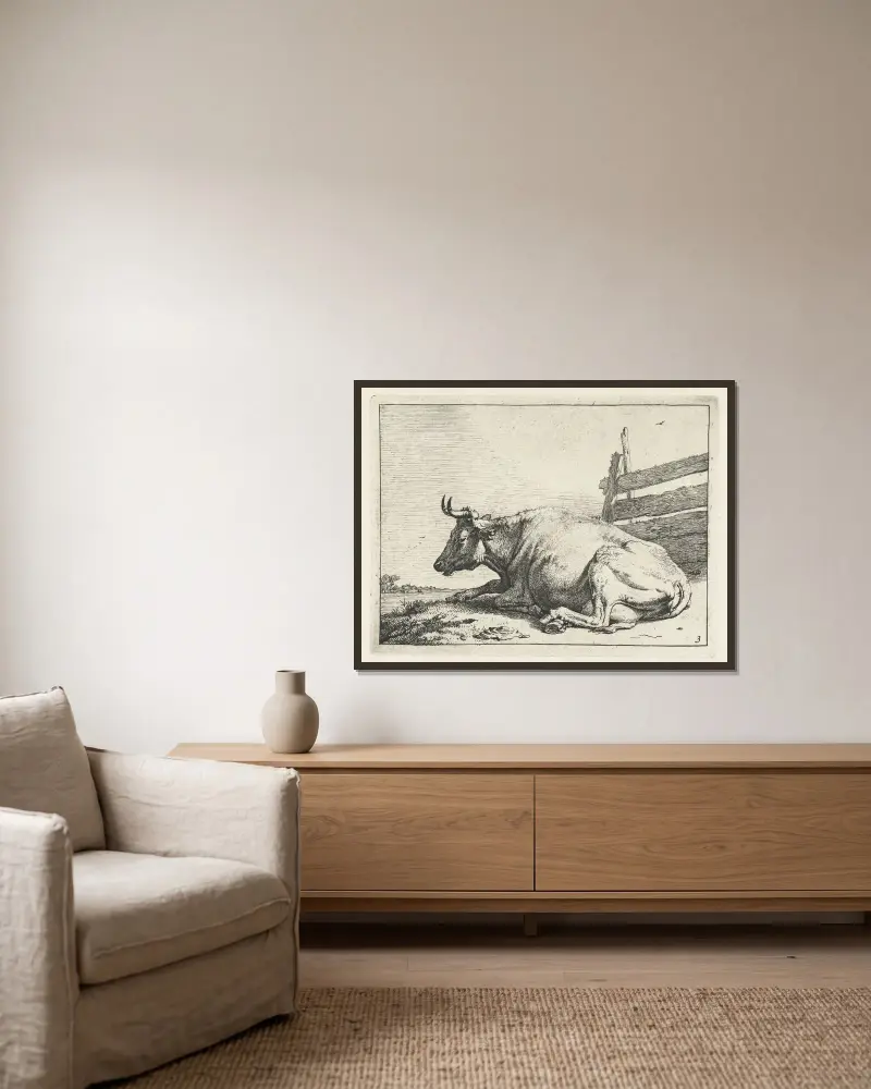 Liegende Kuh an einem Zaun von Paulus Potter gerahmt an einer Wand