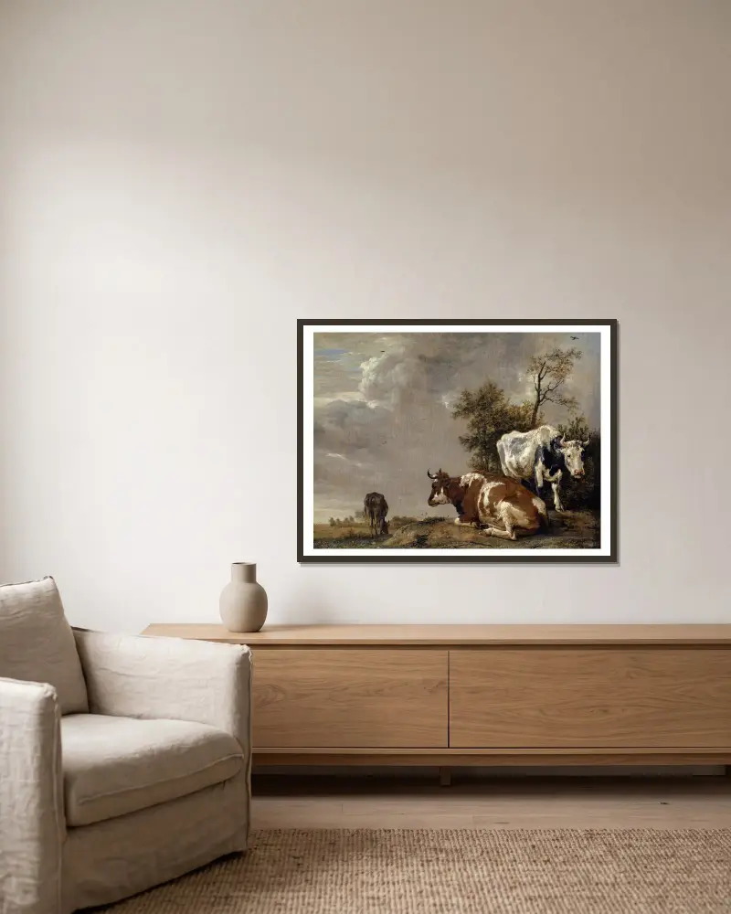 Drei Kühe auf einer Weide von Paulus Potter gerahmt an einer Wand