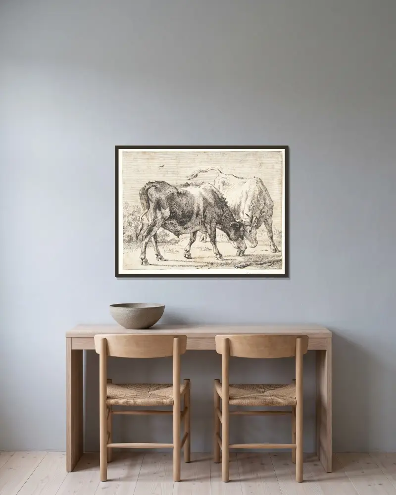 To kæmpende okser av Paulus Potter inramad på en vägg