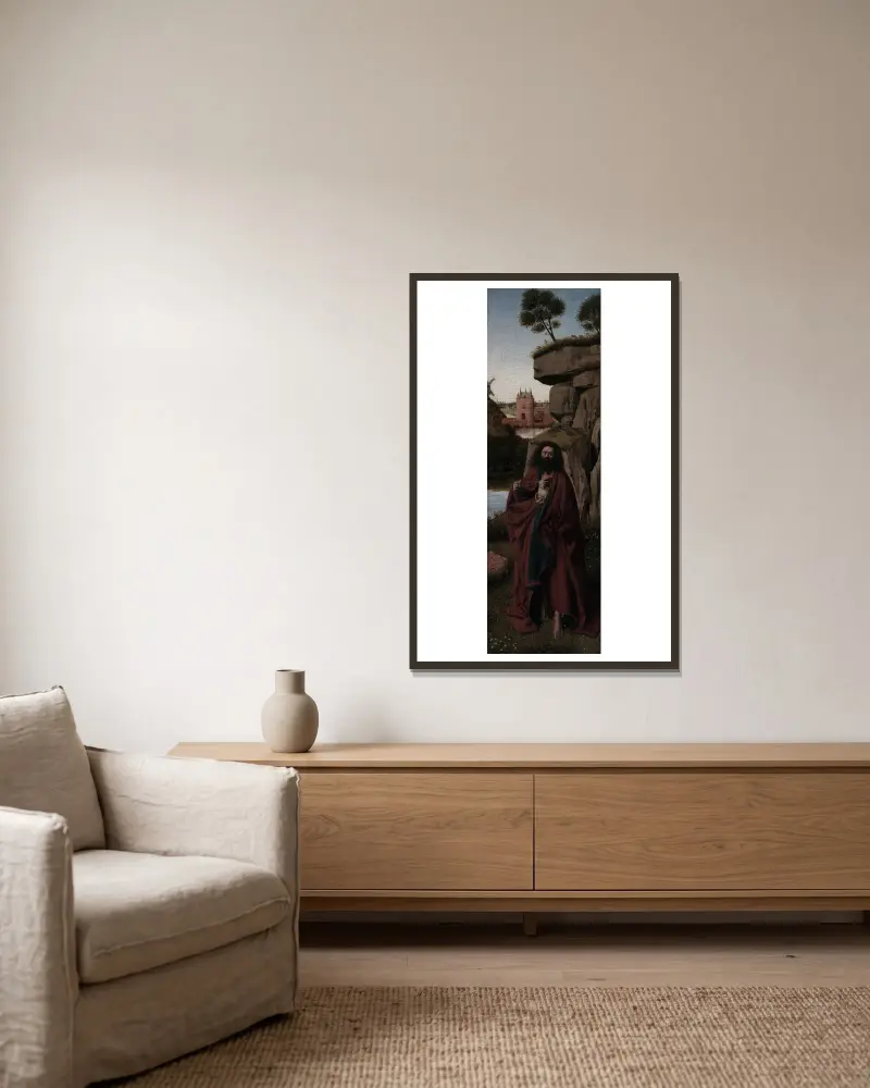 Johannes der Täufer in einer Landschaft von Petrus Christus gerahmt an einer Wand