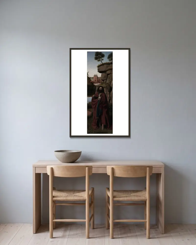 Johannes der Täufer in einer Landschaft von Petrus Christus gerahmt an einer Wand