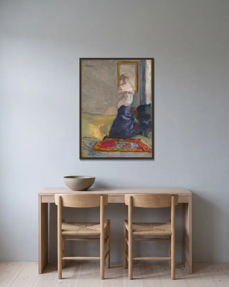 Ung kvinna som klär av sig av Pierre Bonnard inramad på en vägg