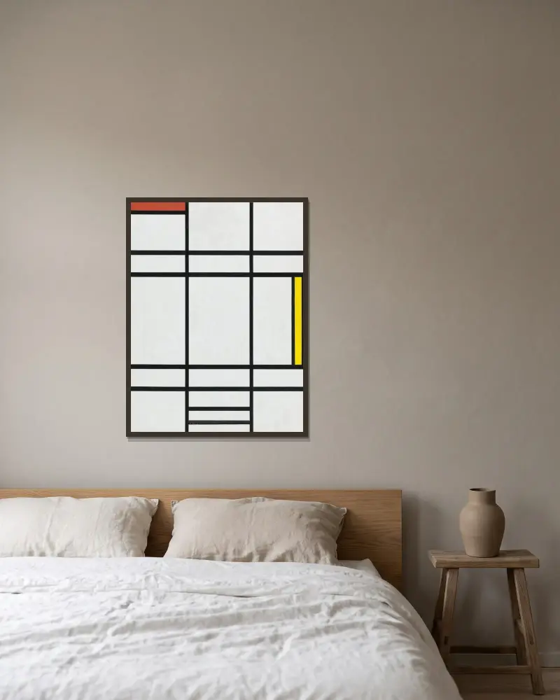 Composition in White, Red, and Yellow av Piet Mondrian inramad på en vägg