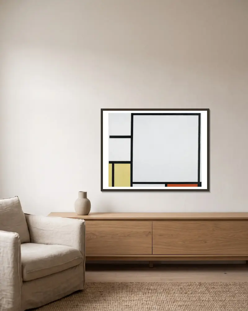 Komposition mit Blau, Rot, Gelb und Schwarz von Piet Mondrian gerahmt an einer Wand