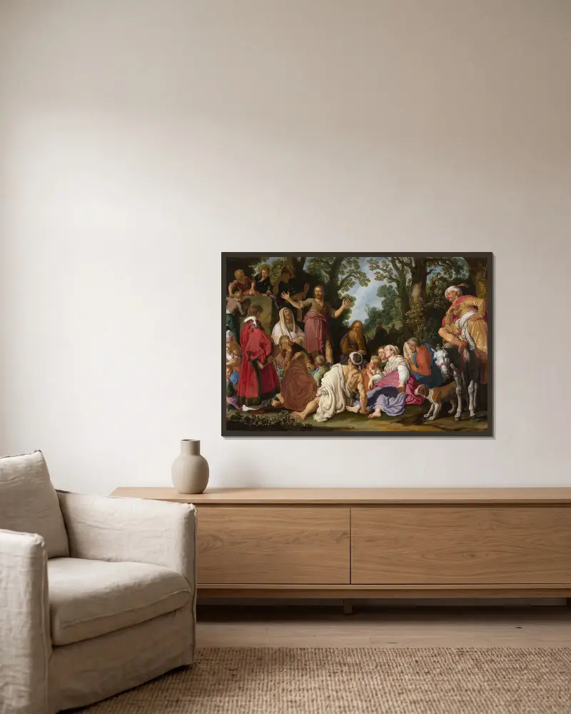 St John the Baptist Preaching av Pieter Lastman inramad på en vägg