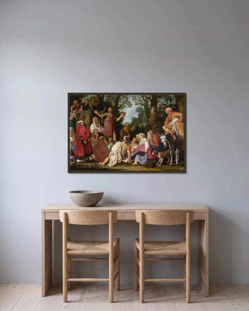 St John the Baptist Preaching av Pieter Lastman inramad på en vägg