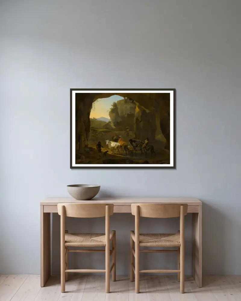 Bönder med boskap i en grotta av Nicolaes Pietersz. Berchem inramad på en vägg