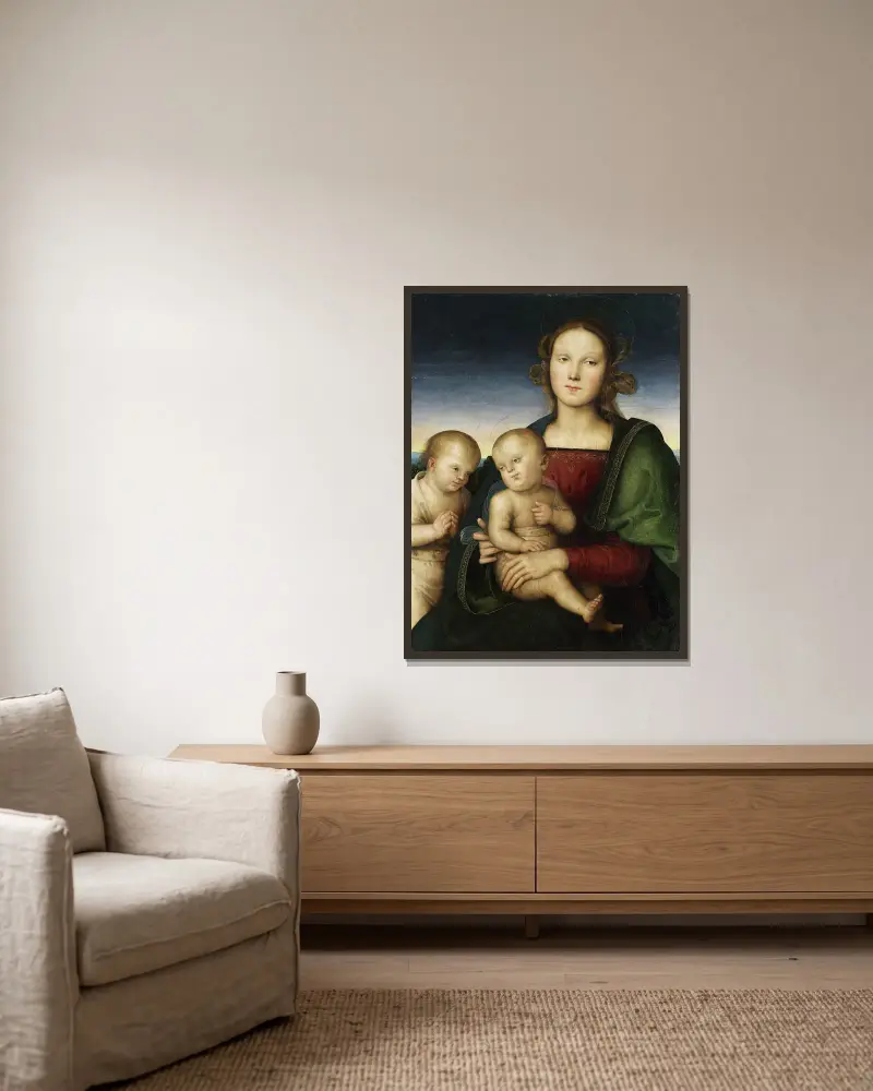 Madonna mit Kind und dem Johannesknaben von Pietro Perugino gerahmt an einer Wand