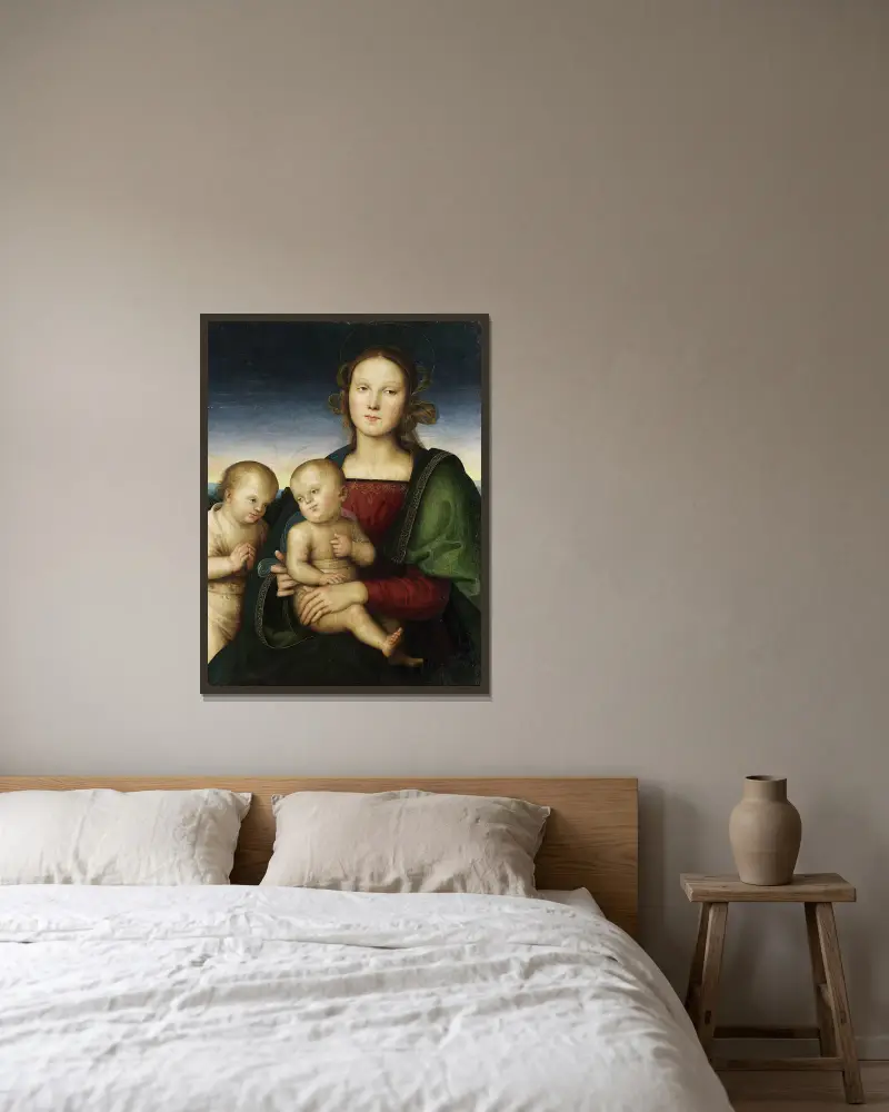 Madonna mit Kind und dem Johannesknaben von Pietro Perugino gerahmt an einer Wand
